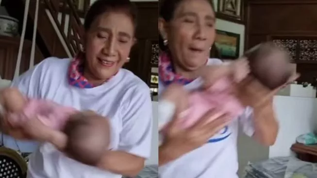 Viral Video Susi Pudjiastuti Gendong dan Ayunkan Bayi